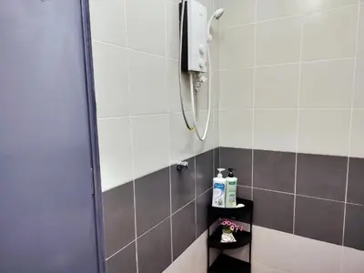 a bathroom with a shower withgray and white tiles at Emerald Avenue Brinchang 8 guests 3 bedrooms in Brinchang