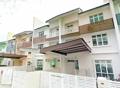 a building with a white fence in front of it at Shamrock Breeze Villa 2: Coastal Haven for 25 Guests in Batu Ferringhi