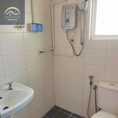 a bathroom with a toilet and a sink at Minimalist Duplex @ BayanLepas in Bayan Lepas