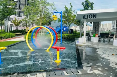 a water park with a water slide in the water at Deluxe Seaview Georgetown Penang @ ComfyLux Homestay in Jelutong