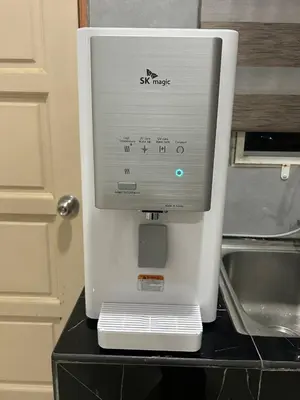 a white mixer sitting on top of a counter at Homestay De' Afraa Sungai Besar IslamFriendly in Sungai Besar
