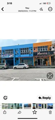 a picture of a car parked in front of a building at BOTANI LOFT HOMESTAY in Ipoh