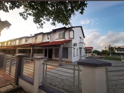 a white house with a fence in front of it at SmartChoice Homestay in Bukit Mertajam