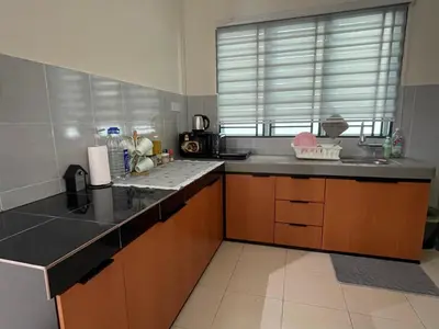 a kitchen with a sink and a counter top at D’Kayangan Homestay BBSAP Sitiawan in Sitiawan