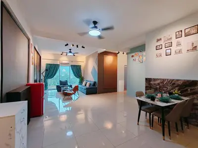 a living room with a table and a dining room at INS Pavillion by irainbow in Ipoh