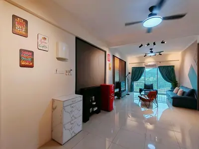 a living room with a couch and a table at INS Pavillion by irainbow in Ipoh