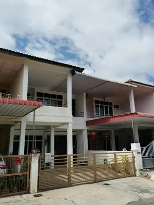 a large house with a fence in front of it at White House 19 Room A in Bukit Mertajam