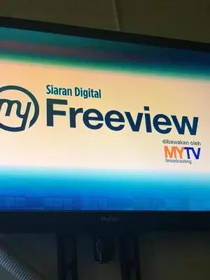 a television screen with the siam digital firewax sign on it at Chalet Naqib in Gerik