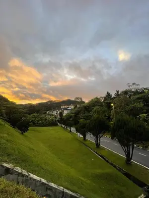 a view of a street with trees and a road at ROYAL LILY TANAH RATA BY JUNIKASTAY in Tanah Rata