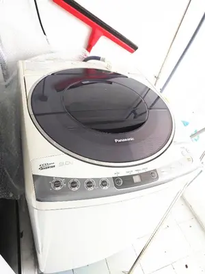 a microwave oven sitting on top of a appliance at EC14-Georgetown-3room-PrivateHouse in George Town