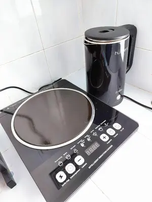 a microwave sitting on top of a kitchen counter at EC14-Georgetown-3room-PrivateHouse in George Town