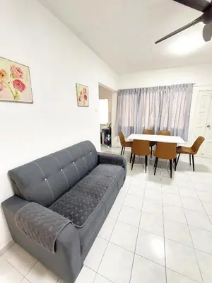 a living room with a couch and a table at EC14-Georgetown-3room-PrivateHouse in George Town