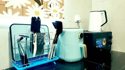 a kitchen counter with a blue appliance with utensils at Ipoh Urban Retreat 20PAX 5 Room Holiday Villa by City Home Empire in Ipoh