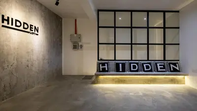 a room with a large window and a sign on the wall at Boutique Hidden loft in Bukit Mertajam