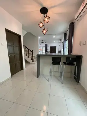 a kitchen with a counter and two stools at Eyu Sweet Home in Sitiawan 10-13 pax free wifi in Sitiawan