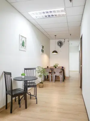 a dining room with a table and chairs at Cheerful Guesthouse #Adventist#BudgetStay in George Town