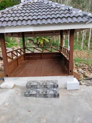a gazebo with a roof on top of it at Homestay Teratak D`kemangi with Private Pool in Baling