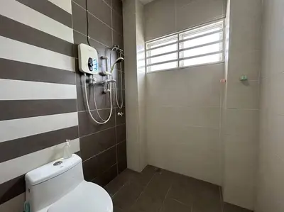 a bathroom with a toilet and a shower at Ipoh Family Cozy Homestay 4R4B 12-13pax SY23 in Ipoh