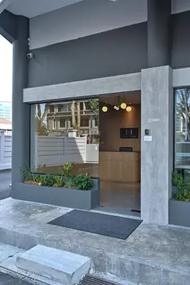 a front entrance to a building with a lobby at Macalister 288 in George Town