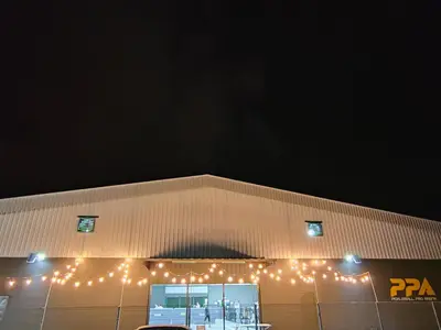 a building with christmas lights on the side of it at Ipoh Station 18 Homestay in Ipoh