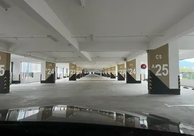 an empty hallway in a building with columns and ceilings at DD Condominium 2Bedroom Sea view Georgetown Penang in Jelutong