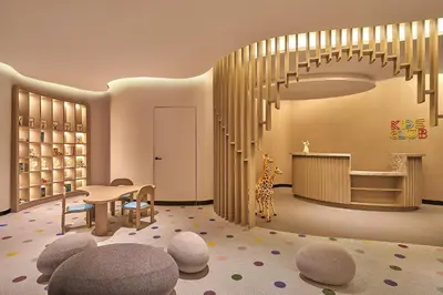 a childrens room with a giraffe and a table and chairs at Penang Marriott Hotel in George Town