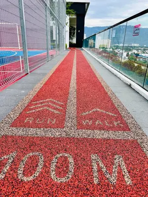 a red carpet on the side of a building at New 2BR or 3BR Homey Getaway stay 7 to 10 pax at Urban Suites, Georgetown by URBAN STAYCATION LOD COSY in Jelutong