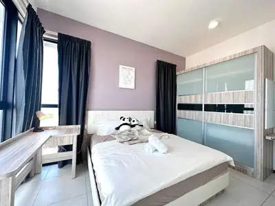 a small bedroom with a bed and a desk at New 2BR OR 3BR Cityview Homestay at Urban Suite BY URBAN STAYCATION LDL in Jelutong