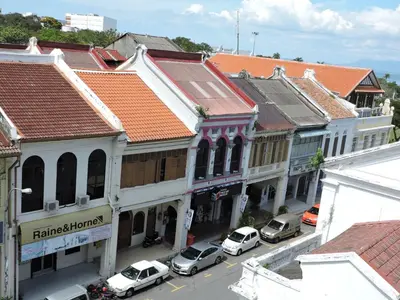 an overhead view of a city street with buildings at Merlin Hotel George Town Penang in George Town