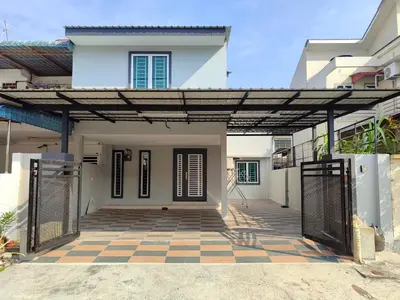 a house with a gate in front of it at Golden 78 Ipoh Homestay in Ipoh
