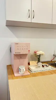 a coffee maker sitting on top of a kitchen counter at SohoMimi Seri Iskandar in Kampung Bota Kiri