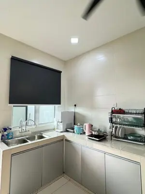 a kitchen with a sink and a tv on the wall at Sekinchan 2008 Homestay Karaoke BBQ in Sekincan