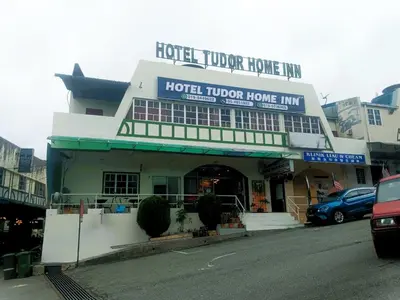 a hotel tucker house inn on a city street at Hotel Tudor Home Inn Cameron Highlands in Brinchang