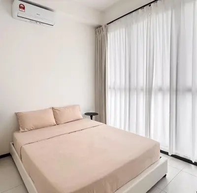 a white bedroom with a bed and a window at Georgetown Seaview & Cityview Childroom Infinity pool with Carpark in Jelutong