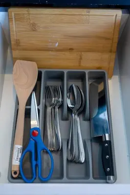 a utensil tray with utensils in a drawer at Urban Suites with Spectacular High Floor View #3BR #03 in Jelutong