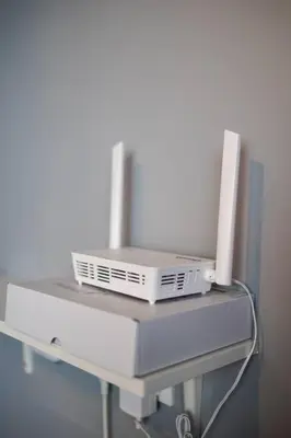 a video game system sitting on top of a shelf at Urban Suites with Spectacular High Floor View #3BR #03 in Jelutong
