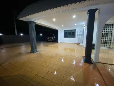 an empty room with two columns in a building at IPOH LYL EVERGREEN HOMESTAY 12pax in Ipoh