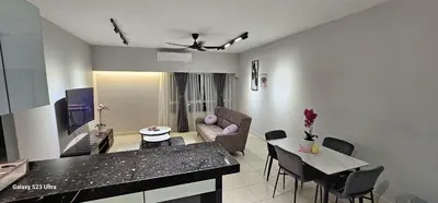 a living room with a couch and a table at IPOH Town R&E Homestay in Ipoh