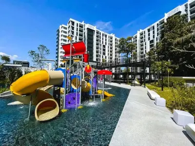 a water slide in the water at a resort at Ipoh Cove Hillview Suite 7-8 pax Tambun Lost World by City Home Empire in Ipoh