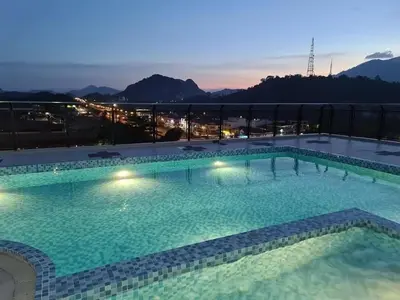 a large swimming pool on the roof of a building at RJ STUDIO 2- Kompleks Mutiara in Gua Musang