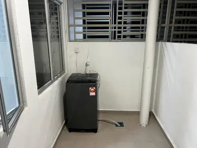 a heater in a room next to a window at Sense In Passionate in Sitiawan