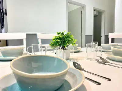 a table with a bowl on top of a table at Decozy 8.0 IpohTownCondo (10pax) in Ipoh