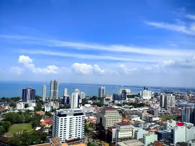 a view of a city with buildings and the ocean at LS Tropicana 218*Sea View*1BR*Georgetown*King Bed in George Town