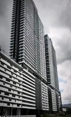 a tall building with many windows on the side of it at Romantic Sea View Room @ Urban Suites, Jelutong in Jelutong
