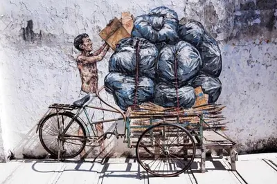 a painting of a man pushing a cart filled with bags at IPOH Chemor Casa Klebang, 5 PAX Fully Air-Con Homestay in Chemor