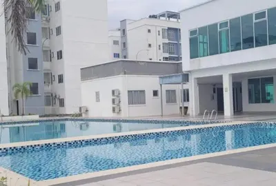 a swimming pool in front of a building at IPOH Chemor Casa Klebang, 5 PAX Fully Air-Con Homestay in Chemor