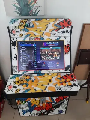 a computer monitor sitting on top of a table at Tambun lost world luxury villa 5BR/20 pax/mahjong/karaok/bbq/garden events in Tambun