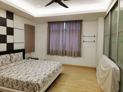 a bedroom with a bed and a ceiling fan at Tambun lost world luxury villa 5BR/20 pax/mahjong/karaok/bbq/garden events in Tambun
