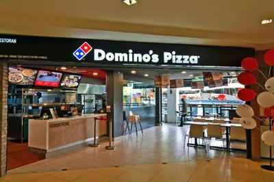 a dominoes pizza restaurant in a shopping mall at Serene Nova Family Retreat (2-6pax)near Kea Farm Market in Brinchang
