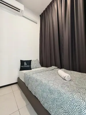 a bedroom with a bed with a black curtain at New Urban Suite Majestics 3BR Homestay at Georgetown BY URBAN STAYCATION LOD PULSE in Jelutong
